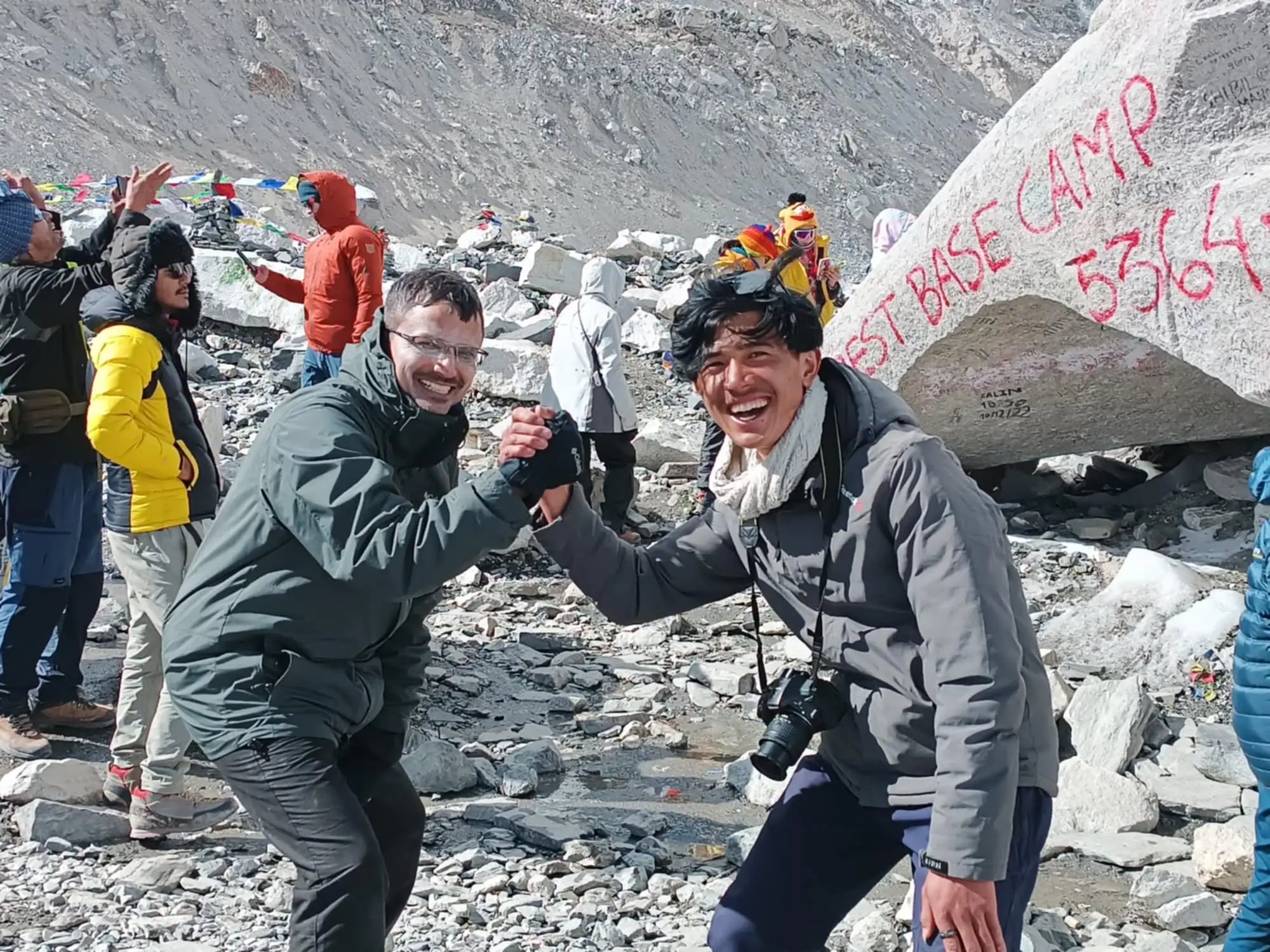 Elysian Quest GUide and Guest Celebrating success at Everest Base Camp